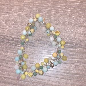 Beaded green dangling charm bracelet